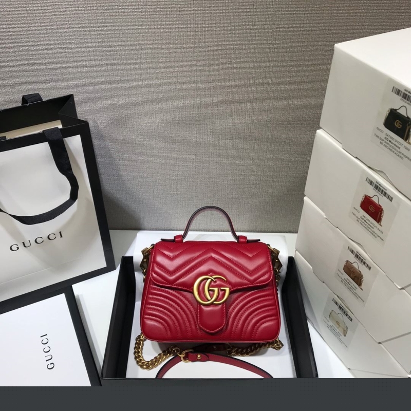 G*u*i top handle bags